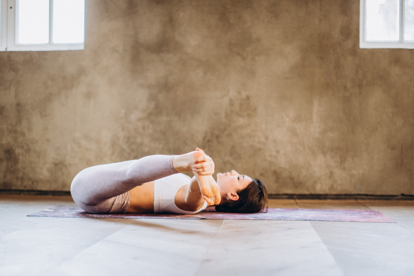 Yoga Poses: Happy Baby Pose (Ananda Balasana)